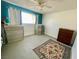 Bright bedroom with neutral walls, carpeted floors, and ample space for furniture at , Las Vegas, NV 89119