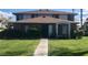 Charming condo featuring a well-maintained lawn and unique architectural elements at , Las Vegas, NV 89119