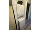 Compact laundry area featuring a stacked washer and dryer for space-saving convenience at , Las Vegas, NV 89119