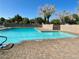 Inviting swimming pool for relaxation, surrounded by a patio and greenery at , Las Vegas, NV 89119