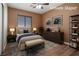A cozy bedroom featuring neutral tones, window, ceiling fan and tasteful decor at , Las Vegas, NV 89131