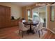 Bright dining area with a round table, comfortable seating, and access to the backyard at , Las Vegas, NV 89131