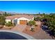 Inviting single-story home featuring a charming facade, landscaped front yard, and a two-car garage at , Las Vegas, NV 89131