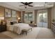 Serene main bedroom featuring a large bed, soft lighting, and a private outdoor patio at , Las Vegas, NV 89131