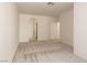 Relaxing bedroom with plush carpeting, neutral walls, and easy bathroom access at 1012 Collingtree St, Las Vegas, NV 89145