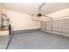 Spacious two-car garage with epoxy flooring and ample storage space at 1012 Collingtree St, Las Vegas, NV 89145