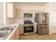 Bright kitchen featuring stainless steel appliances and ample counter space at 1012 Collingtree St, Las Vegas, NV 89145