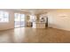 Open-concept living space with tile flooring and a modern kitchen island at 1012 Collingtree St, Las Vegas, NV 89145