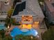 Stunning aerial view of a home with a pool, balcony, and solar panels at 1016 Sable Mist Ct, Las Vegas, NV 89144