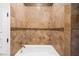 Bathroom featuring a bathtub with tile surround and decorative tile accents at 1016 Sable Mist Ct, Las Vegas, NV 89144