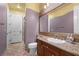 A clean bathroom showcasing modern fixtures, granite countertop, and neutral color palette at 1016 Sable Mist Ct, Las Vegas, NV 89144