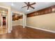 This is a stylish bedroom offering wood floors, ceiling fan, and built-in cabinets at 1016 Sable Mist Ct, Las Vegas, NV 89144
