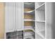 Walk-in closet with white shelving and ample storage space at 1016 Sable Mist Ct, Las Vegas, NV 89144
