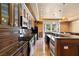Gourmet kitchen featuring granite countertops, custom wood cabinets, and stainless steel appliances at 1016 Sable Mist Ct, Las Vegas, NV 89144