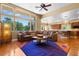 Bright living room featuring a large window and comfortable seating area at 1016 Sable Mist Ct, Las Vegas, NV 89144
