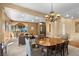 Open living area with chandelier, sitting area and front door entrance at 1016 Sable Mist Ct, Las Vegas, NV 89144