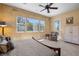 Main bedroom featuring a ceiling fan, natural light and a doorway to the exterior at 1016 Sable Mist Ct, Las Vegas, NV 89144