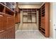 Large walk-in closet with custom wood shelves and drawers at 1016 Sable Mist Ct, Las Vegas, NV 89144