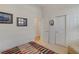 Bright bedroom with closet, neutral paint and carpet, and bright window with shutters at 10320 Luxembourg Ave, Las Vegas, NV 89145