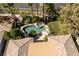 Aerial view of a backyard featuring a kidney-shaped pool, spa, and patio area at 10320 Luxembourg Ave, Las Vegas, NV 89145
