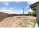 Shot of the backyard area, featuring ample space and privacy fencing at 104 Stanford St, Las Vegas, NV 89107