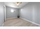 Neutral bedroom featuring ceiling fan, updated floors, and neutral paint at 104 Stanford St, Las Vegas, NV 89107