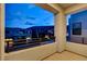 Balcony view of modern homes in a community with sleek design and neutral color palette at 10752 Patina Hills Ct, Las Vegas, NV 89135