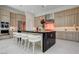 Gourmet kitchen featuring a large island, stainless steel appliances, and custom cabinetry at 10752 Patina Hills Ct, Las Vegas, NV 89135