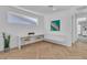 Bright home office with built-in desk, modern decor, and ample natural light at 10752 Patina Hills Ct, Las Vegas, NV 89135