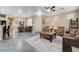 Spacious area with living room, dining area, and front entrance, featuring tiled floors at 1076 Crescent Falls St, Henderson, NV 89011