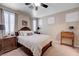 Inviting main bedroom with a plush bed, side tables, and a window with shutters, offering a cozy retreat at 1076 Crescent Falls St, Henderson, NV 89011