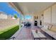 Open patio space featuring seating and an outdoor kitchen at 1076 Crescent Falls St, Henderson, NV 89011