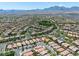 Extensive aerial view of the community showcasing the neighborhood's layout and well maintained streets at 11253 Revelry Ln, Las Vegas, NV 89138