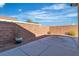 Backyard featuring a patio area and privacy wall, perfect for outdoor enjoyment at 11253 Revelry Ln, Las Vegas, NV 89138