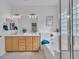 Bathroom with dual sinks, soaking tub, separate glass shower and decorative lighting at 11253 Revelry Ln, Las Vegas, NV 89138