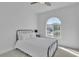 Cozy bedroom featuring a ceiling fan, carpet, and large window for natural light at 11253 Revelry Ln, Las Vegas, NV 89138