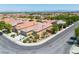 Single-story home with a tile roof, desert landscaping, and a paved driveway in a residential neighborhood at 11253 Revelry Ln, Las Vegas, NV 89138