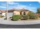 Single-story home featuring a tile roof, well-maintained landscaping, and a welcoming facade at 11253 Revelry Ln, Las Vegas, NV 89138