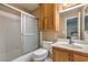Well-maintained bathroom featuring a shower-tub combination and a vanity with good lighting and storage space at 1201 N Buffalo Dr # 202, Las Vegas, NV 89128