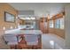 Bright kitchen with stainless steel appliances and a breakfast bar, perfect for casual dining and entertaining at 1201 N Buffalo Dr # 202, Las Vegas, NV 89128