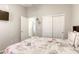 Comfortable bedroom featuring a ceiling fan and a spacious closet for storage at 1208 Neva Ranch Ave, North Las Vegas, NV 89081