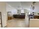 Bright living room with tile flooring, fireplace, and vaulted ceilings at 1208 Neva Ranch Ave, North Las Vegas, NV 89081