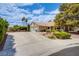 Inviting single-story home with well-manicured landscaping and a spacious driveway at 151 Enloe St, Henderson, NV 89074