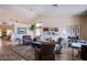 Bright living room with hardwood floors, a vaulted ceiling, and comfortable seating at 151 Enloe St, Henderson, NV 89074
