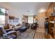 Cozy living room featuring neutral colors, comfortable seating, and lots of natural light at 151 Enloe St, Henderson, NV 89074