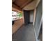 View of the balcony with a door and window providing natural light in the outdoor space at 1515 E Reno Ave # C207, Las Vegas, NV 89119