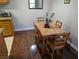 Cozy dining area with laminate flooring, perfect for intimate meals at 1515 E Reno Ave # C207, Las Vegas, NV 89119