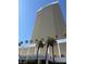 Towering high-rise with gold facade, palm trees in the front, and clear blue sky at 2000 N Fashion Show Dr # 2627, Las Vegas, NV 89109