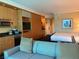 Cozy living area with a sofa, kitchenette, and view of the comfortable bedroom at 2000 N Fashion Show Dr # 2627, Las Vegas, NV 89109