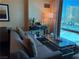 Living area with stylish sofa, coffee table, and a view of the Las Vegas skyline at 2000 N Fashion Show Dr # 2627, Las Vegas, NV 89109